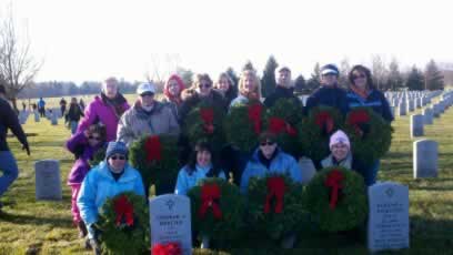 Headstones with wreaths at Saratoga National Cemetery